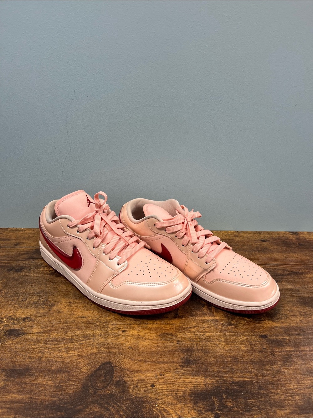 Jordan Women’s Pink Low-Top Sneakers with Red Swoosh